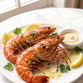Grilled whole tiger prawns with lemon and dipping sauce